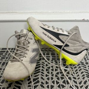 New Balance womens Light Gray Lacrosse Cleats with Neon Yellow Soles